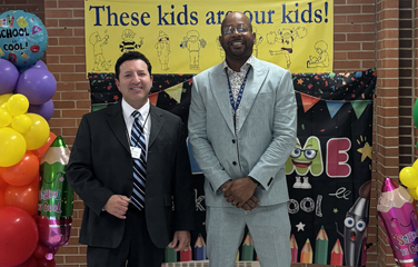  Chief Student Support, Security, and Information Officer) and Mr. Gates on the 1st Day of School 